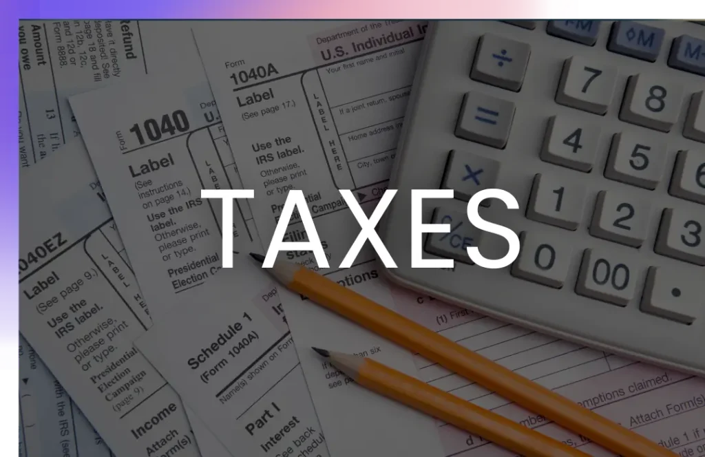 A calculator, pencils, and various tax forms scattered on a desk, overlaid with the word "TAXES" in bold white letters.